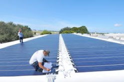 Installing the Solar Panels for Waste Pro's Headquarters