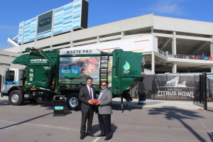 John J. Jennings (right) Chairman and CEO of Waste Pro, headquartered in Central Florida, was recognized today for Waste Pro’s sponsorship of Florida Citrus Sports at Orlando’s Citrus Bowl. Steve Hogan, CEO for Florida Citrus Sports presented the ball.