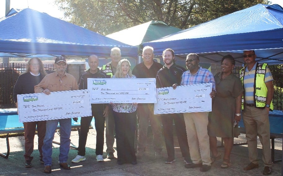 Pictured: Left To Right, Jennifer Herring, Dvp Atlanta, Ga; Tom Wassel, Commercial Sales, Athens, Ga; Svp And Coo Keith Banasiak, Regional Vp Mike Mcgann; Sybil Ginn, Corporate Contract And Acquisitions Manager; Dvp North Georgia Hauling, Jerry Harrison; President And Ceo Sean Jennings; Athens Roll Off Driver Stanley Latimore; Stanley'S Wife, Sharon Latimore, Athens Division Manager Michael Viers 